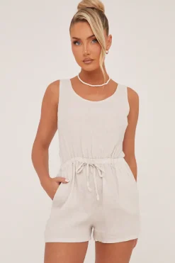Rebellious Fashion Beige Elasticated Waist Tie Back Playsuit - Jovee