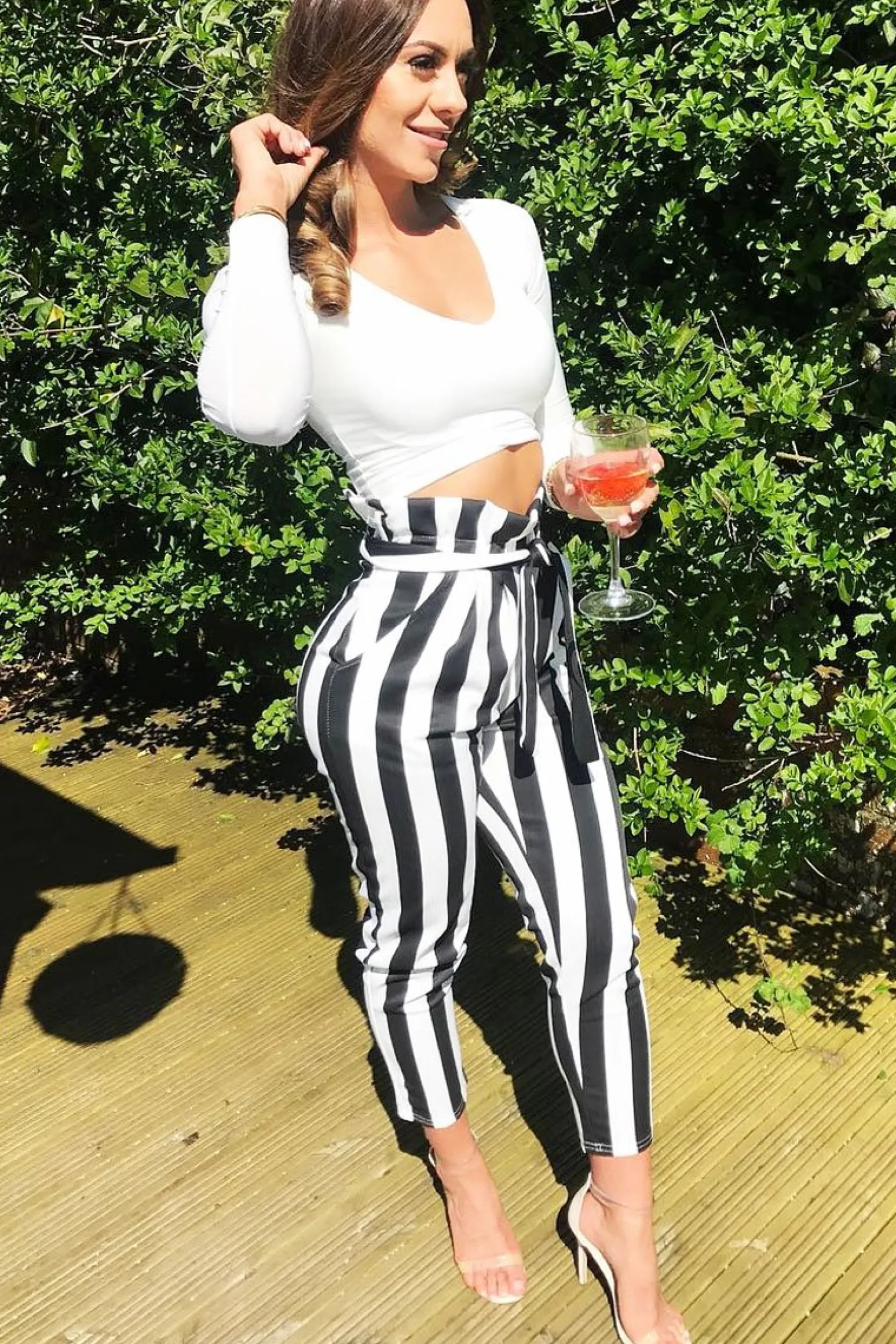 Rebellious Fashion Black and White Striped Tie Waist Tapered Trousers - Dura