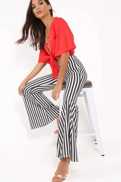 Rebellious Fashion Black And White Stripe Flared Trousers - Chessa