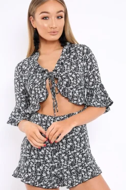 Rebellious Fashion Black Floral Frill Front Cut Out Playsuit - Joanne