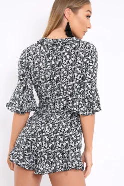 Rebellious Fashion Black Floral Frill Front Cut Out Playsuit - Joanne