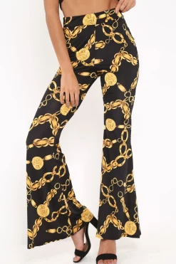 Rebellious Fashion Black Gold Chain Print Flared Trousers - Brooke