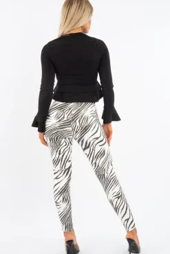 Rebellious Fashion Black Peplum Frill Long Sleeve Top - Fari