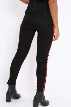 Rebellious Fashion Black Ripped Knee Red Stripe Skinny Jeans - Lucia