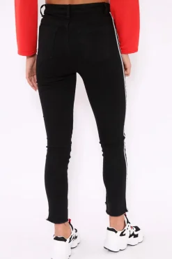 Rebellious Fashion Black Side Stripe Dip Hem Skinny Jeans - Tinlee