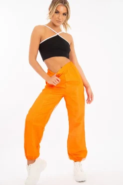 Rebellious Fashion Black White Cross Front Straps Ribbed Crop Top - Vixi