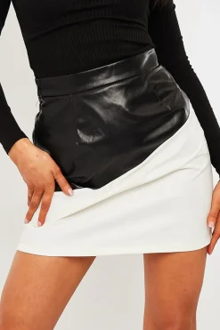 Rebellious Fashion Black White Half Splice PU Skirt - Yazz