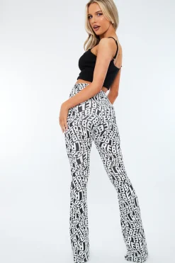 Rebellious Fashion Black White Rebel Print Flare Trousers - Indy