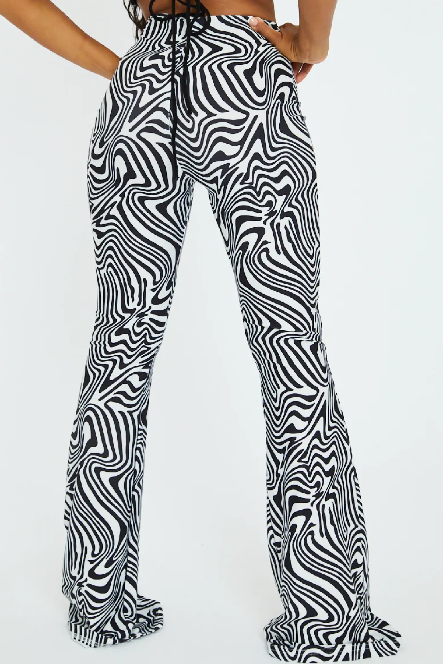 Rebellious Fashion Black White Wave Print Slinky Flare Trousers - Ila