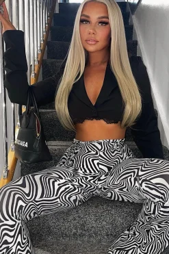 Rebellious Fashion Black White Wave Print Slinky Flare Trousers - Ila