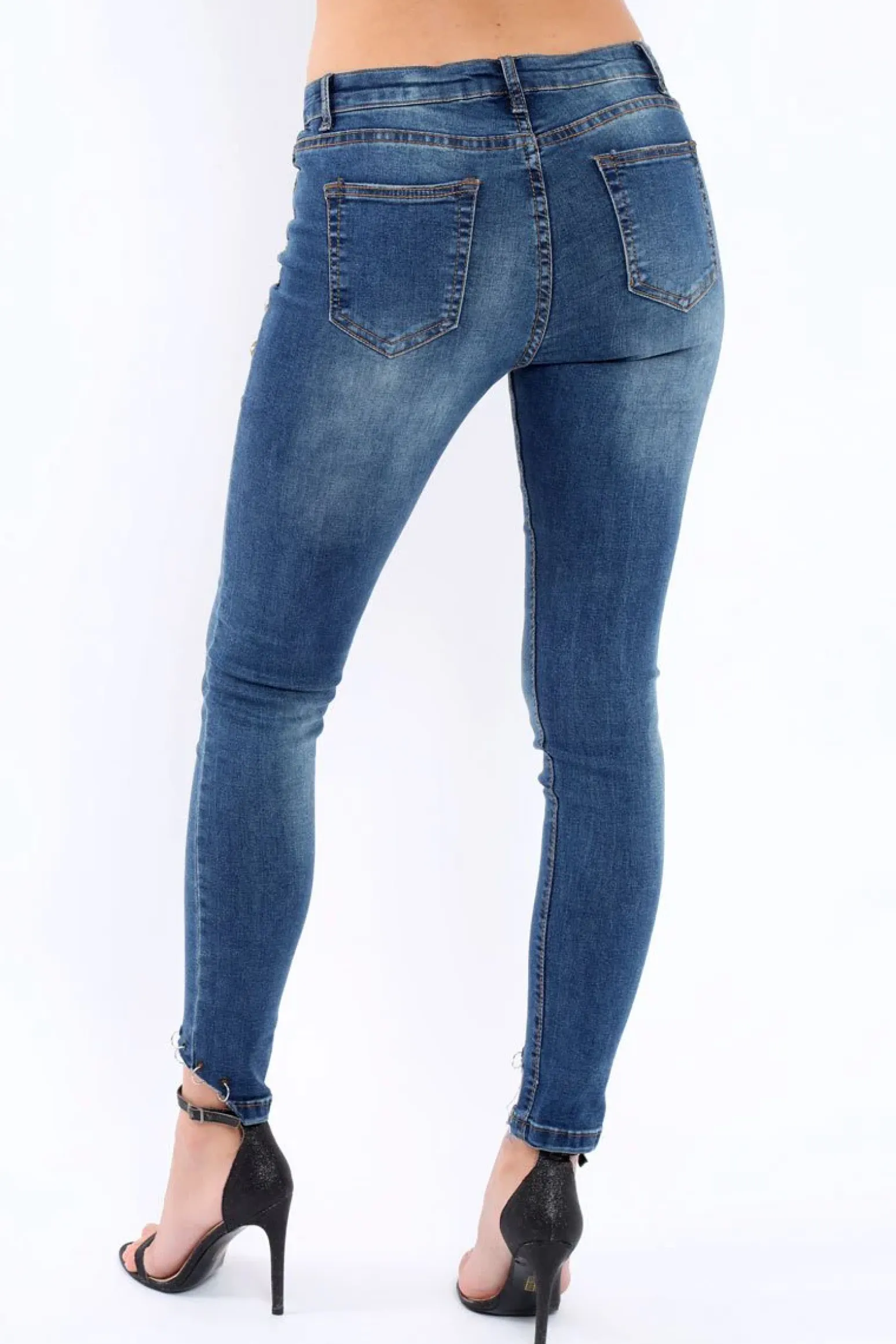 Rebellious Fashion Blue Denim Stud And Eyelet Ring Dip Hem Skinny Jeans - Lesha