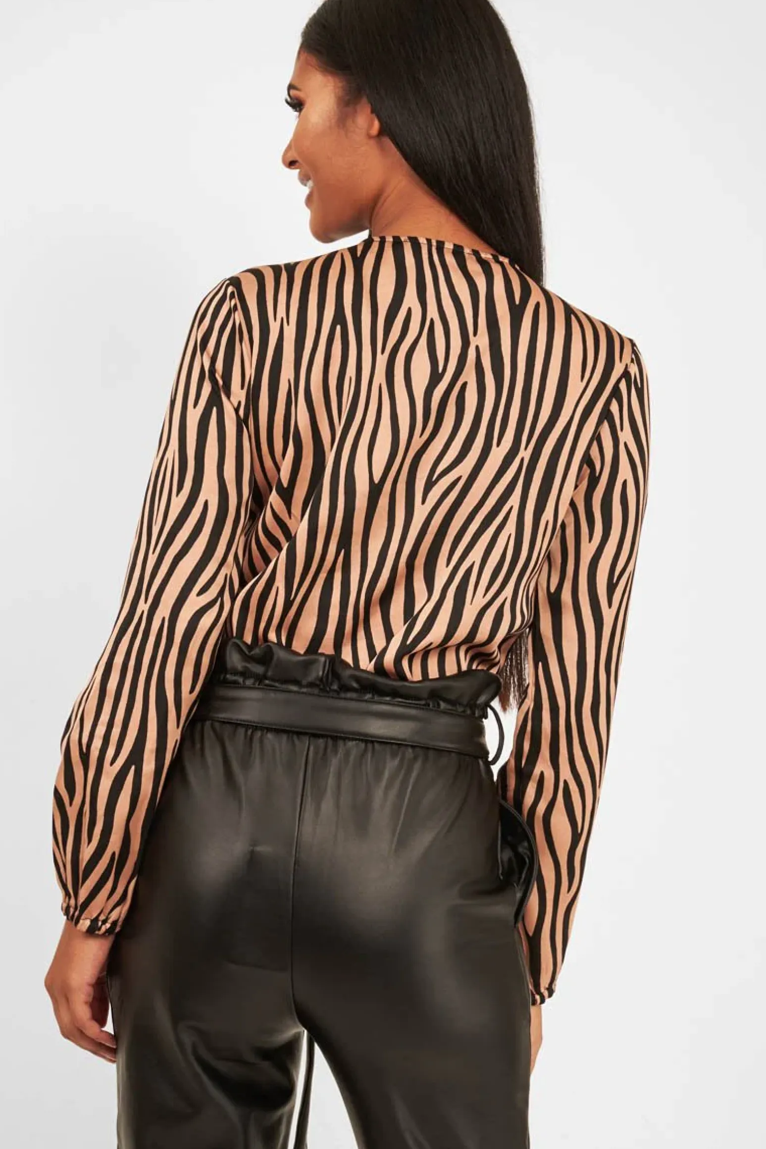 Rebellious Fashion Brown Zebra Print Plunge Bodysuit - Aaralyn