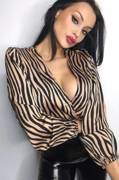 Rebellious Fashion Brown Zebra Print Plunge Bodysuit - Aaralyn