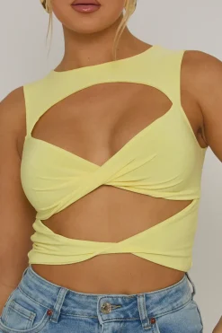 Rebellious Fashion Butter Yellow Twist Front Cut Out Top - Sonia