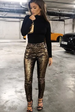 Rebellious Fashion Gold Metallic Coated Snake Print Jeans - Tamsin