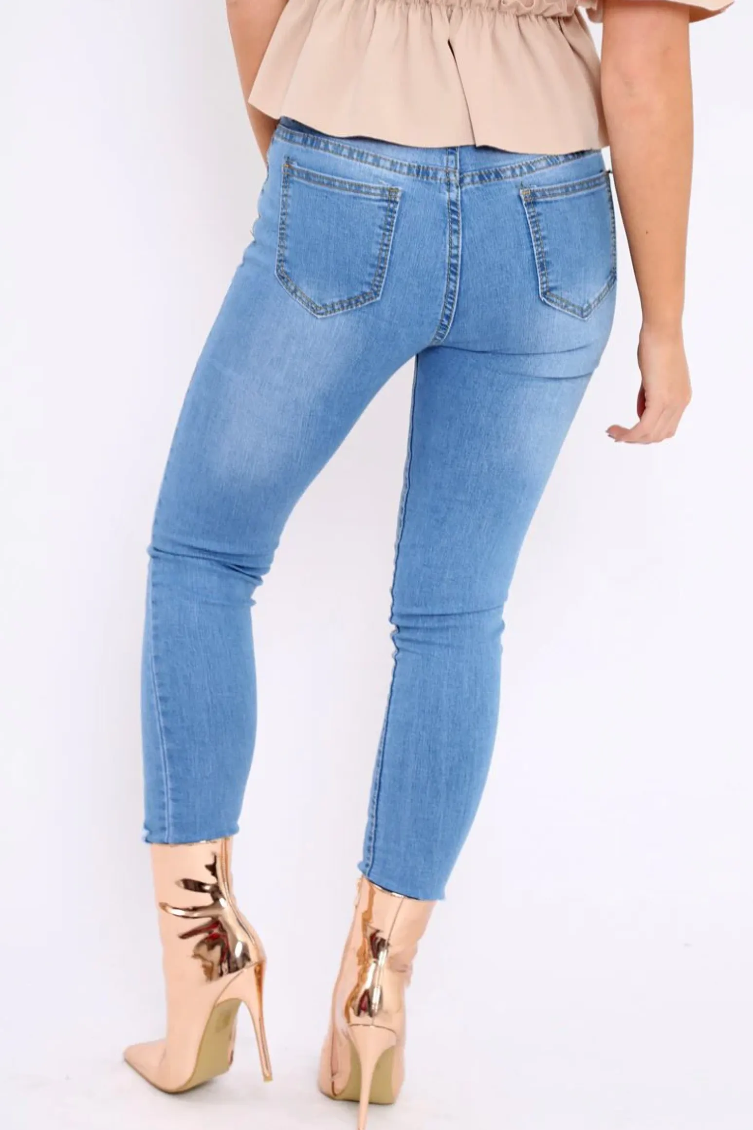 Rebellious Fashion Light Blue Denim Distressed Skinny Jeans - Emberlie