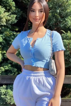 Rebellious Fashion Light Blue Ribbed ButtonFrill Hem Crop Top - Pennie