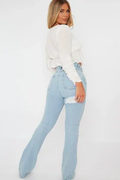 Rebellious Fashion Light Blue Ripped Flare Jeans - Elze