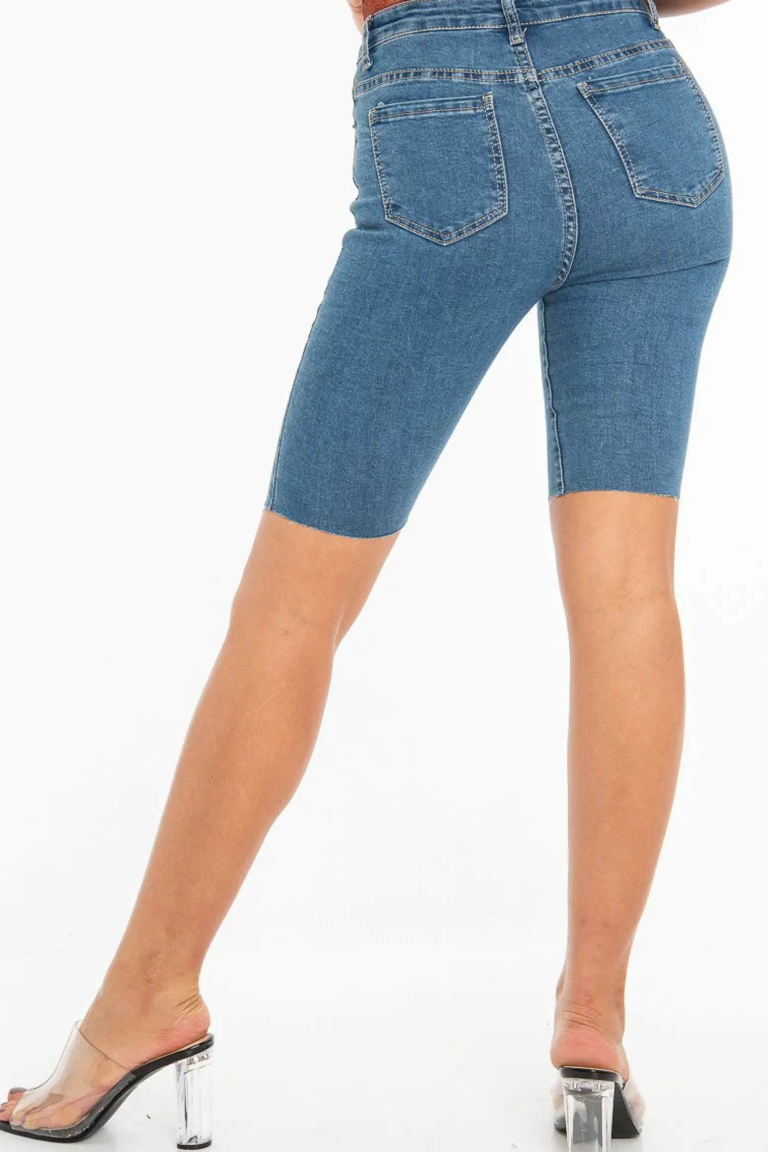 Rebellious Fashion Mid Wash Raw Hem Longline Cycle Denim Shorts - Reanna