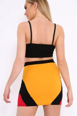 Rebellious Fashion Mustard Black And Red Colour Block Zip Front Mini Skirt and Bralet Co-ord - Kacey