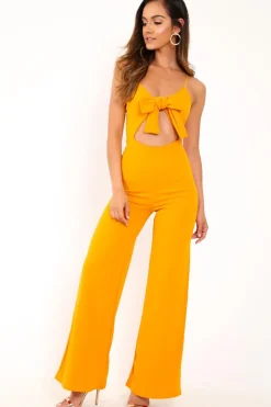 Rebellious Fashion Mustard Tie Front Cut Out Jumpsuit - Jodee