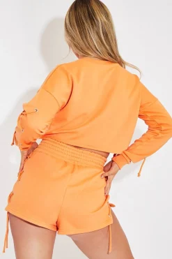 Rebellious Fashion Orange Eyelet Lace Up Shorts - Philippa