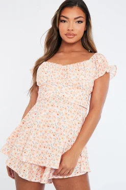 Rebellious Fashion Orange Floral Print Frill Playsuit - Palmira