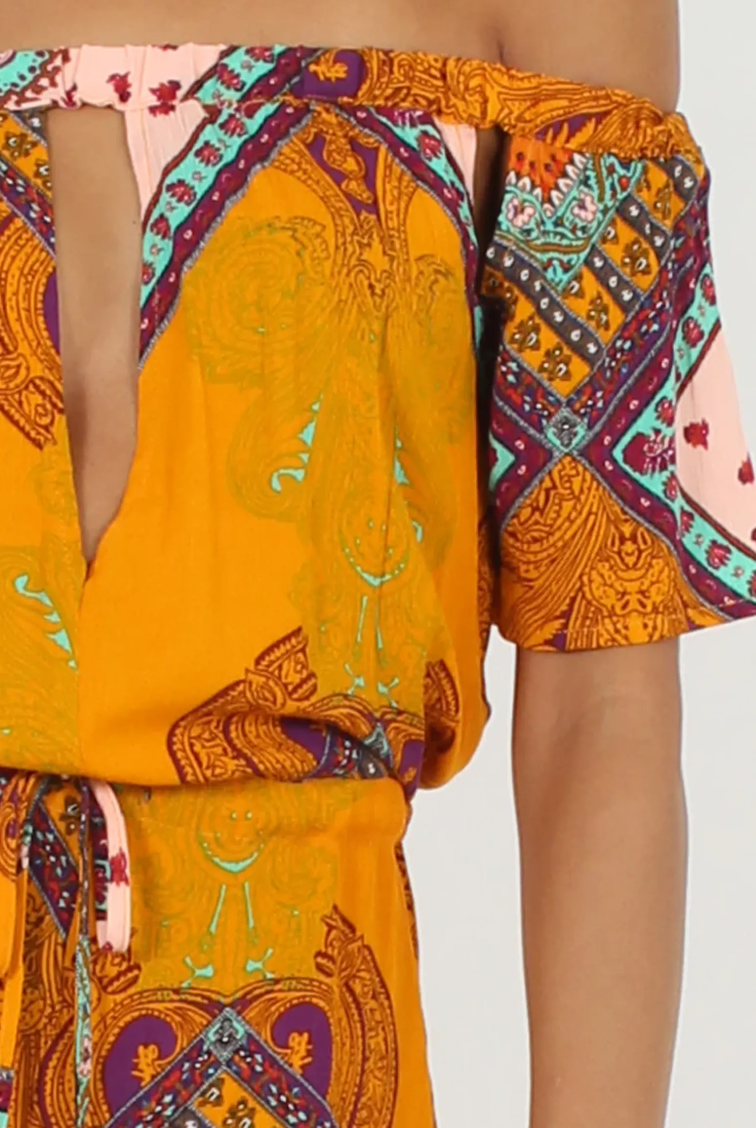 Rebellious Fashion Orange Paisley Print Cut out Detail Bardot Playsuit- Abby