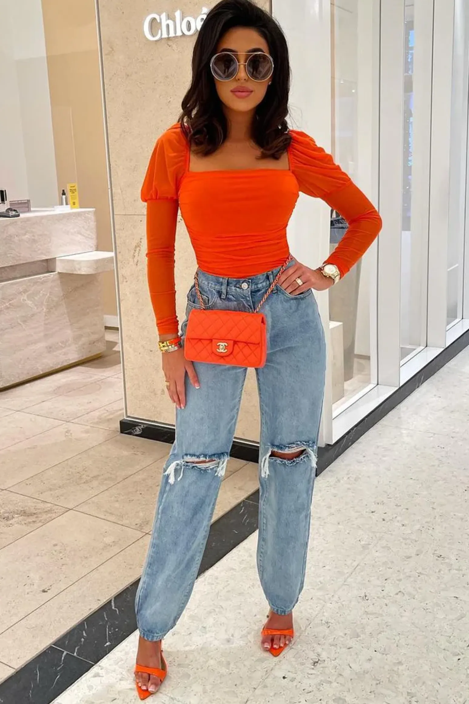Rebellious Fashion Orange Ruched Body Mesh Sleeve Bodysuit - Raeya