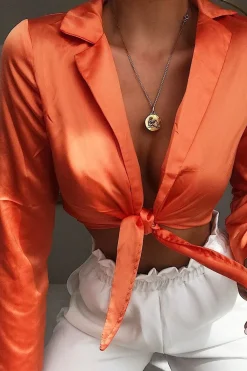 Rebellious Fashion Orange Satin Cut Out Tie Front Bodysuit - Ezabella