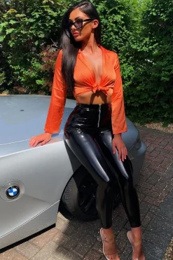 Rebellious Fashion Orange Satin Cut Out Tie Front Bodysuit - Ezabella