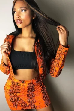 Rebellious Fashion Orange Snake Print Trucker Jacket Mini Skirt Co-Ord - Kiera