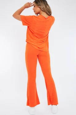 Rebellious Fashion Orange Towelling T- Shirt & Flare Trouser Set - Tania