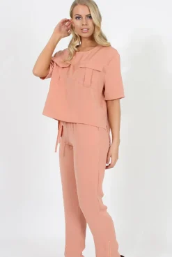 Rebellious Fashion Pink Pocket Front Detail Dipped Hem Trousers - Kem