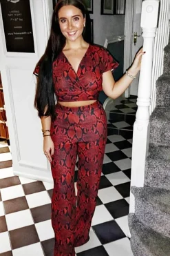 Rebellious Fashion Red Snake Print Tie Back Crop Top And Wide Leg Trouser Co-ord - Georgine