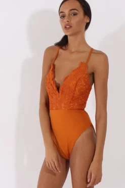 Rebellious Fashion Rust Crochet Cross Back Bodysuit - Crecia