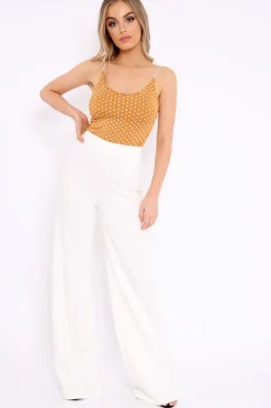 Rebellious Fashion Tan Polka Dot Bodysuit - Tari