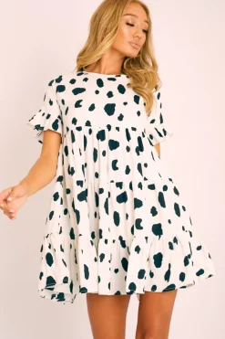 Rebellious Fashion White Black Cow Print Tiered Smock Dress - Makensi
