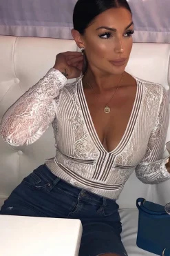 Rebellious Fashion White and Nude Lace Long Sleeve Open Back Bodysuit - Ellice