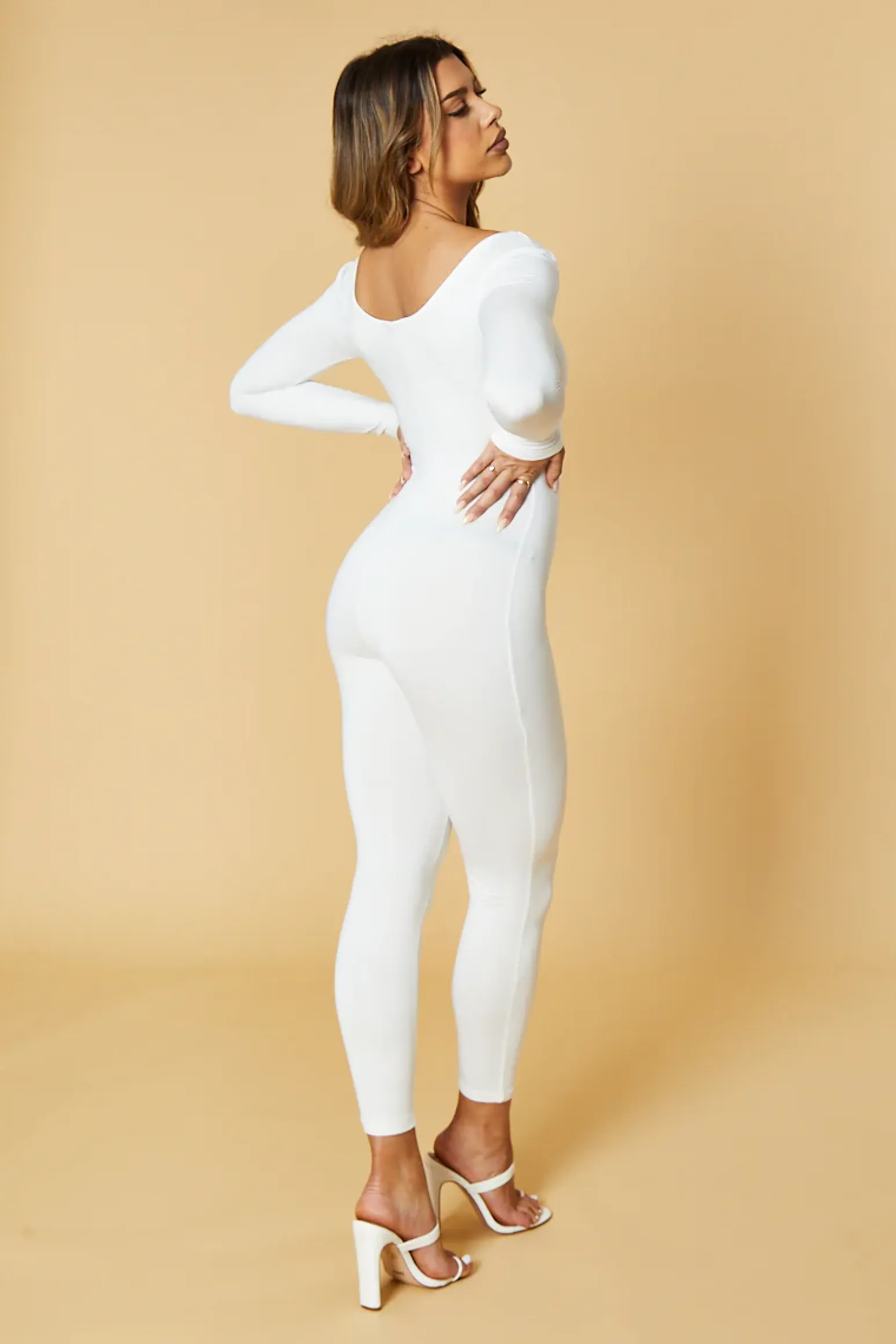 Rebellious Fashion White Contour Long Sleeve Jumpsuit -- Luana