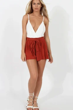 Rebellious Fashion White Cross Front Bodysuit - Tarren