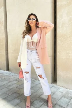 Rebellious Fashion White Extremely Ripped Denim Mom Jeans - Ellynor