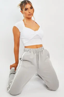 Rebellious Fashion White Slinky Twist Front Crop Top - Diane