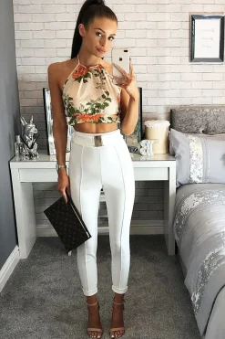 Rebellious Fashion White Tapered Trousers With Gold Buckle - Zyana