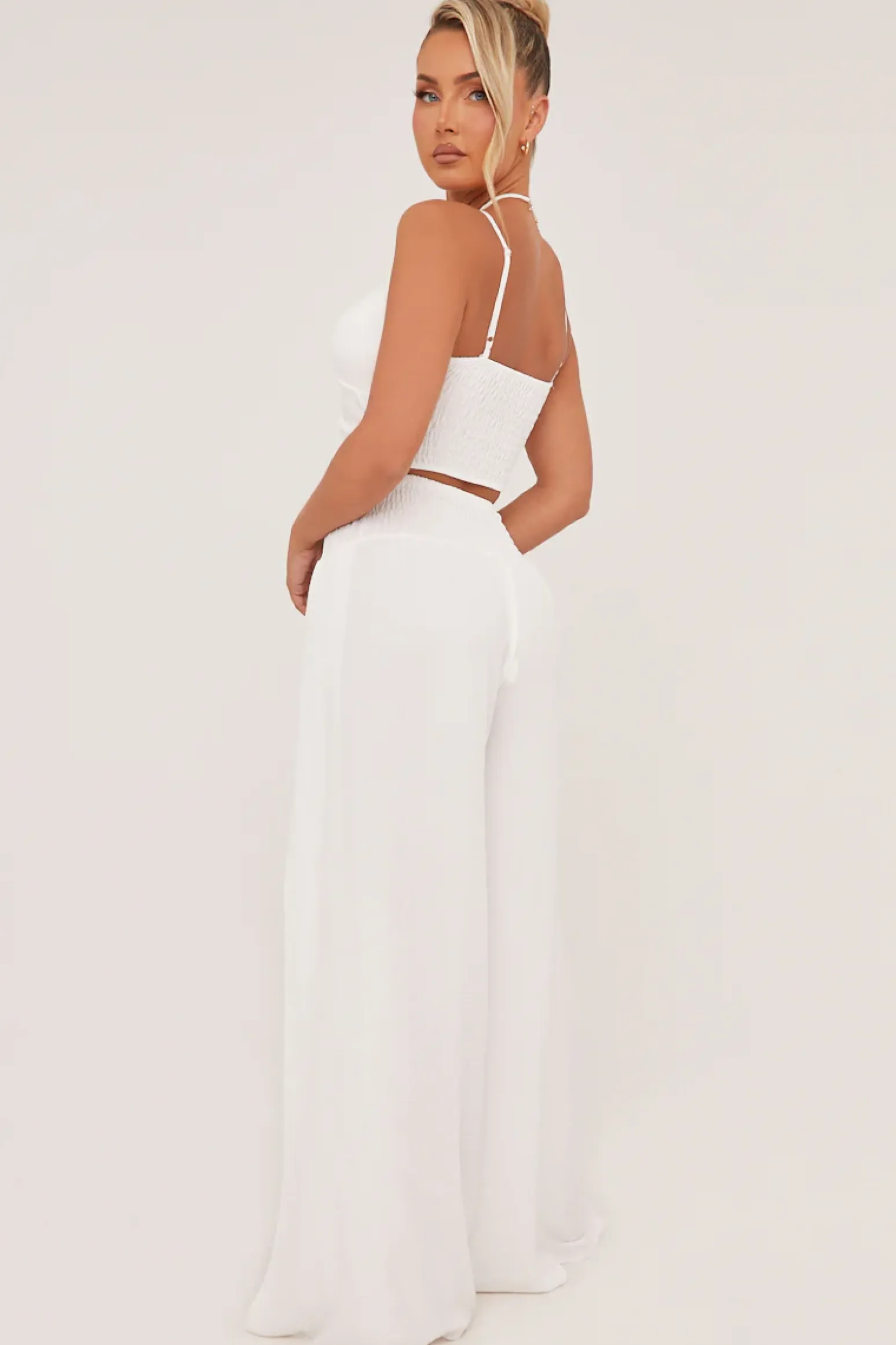 Rebellious Fashion White Twist Front Cropped Top & Flared Leg Trouser Co-ord Set - Lyra