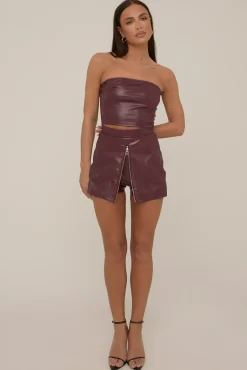 Rebellious Fashion Wine Faux Leather Zip Front Top And Skort Co-ord Set - Saffron