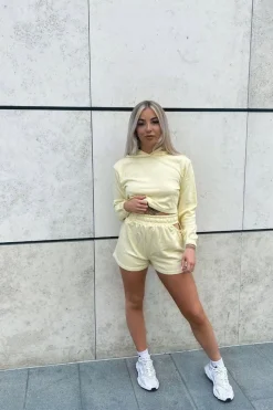 Rebellious Fashion Yellow Hip Cut Out Elasticated Shorts - Zaleia