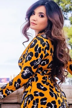 Rebellious Fashion Yellow Leopard Long Sleeve Plunge Playsuit - Kailaya