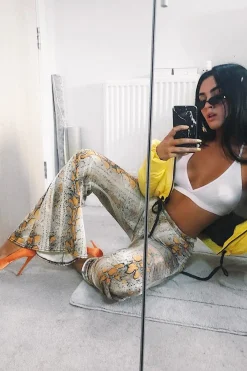 Rebellious Fashion Yellow Snake Print High Waisted Flared Trousers - Kamryn